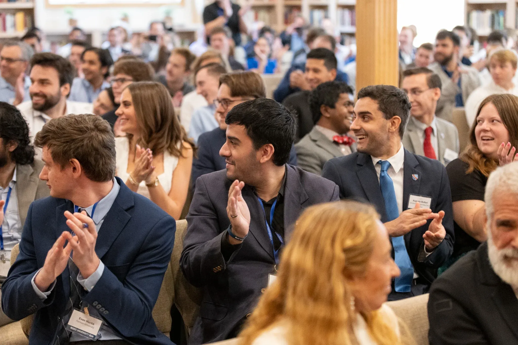 Audience applauding at Mises University