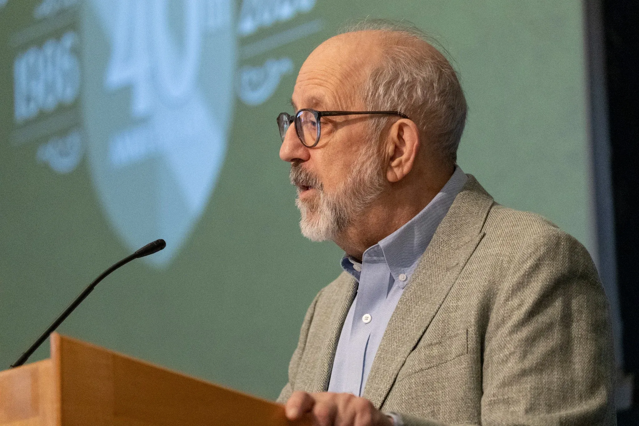 A scholar speaking at the Mises Institute podium
