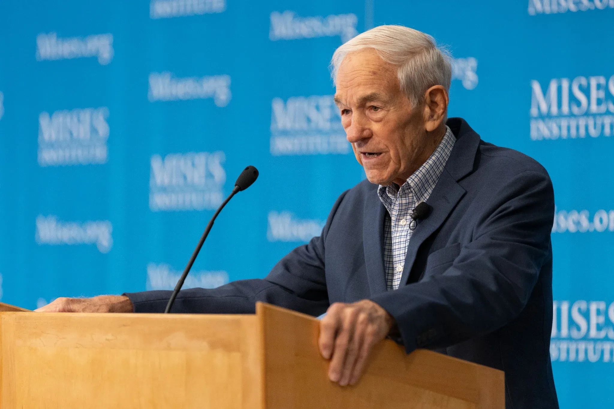 A speaker addressing students at the Mises Institute