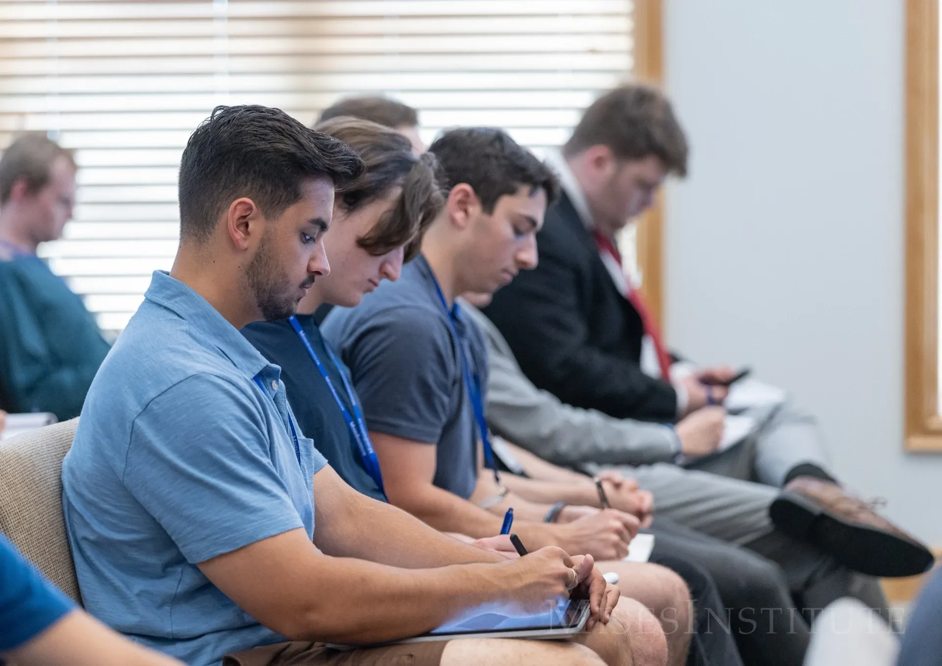Students taking notes in the classroom