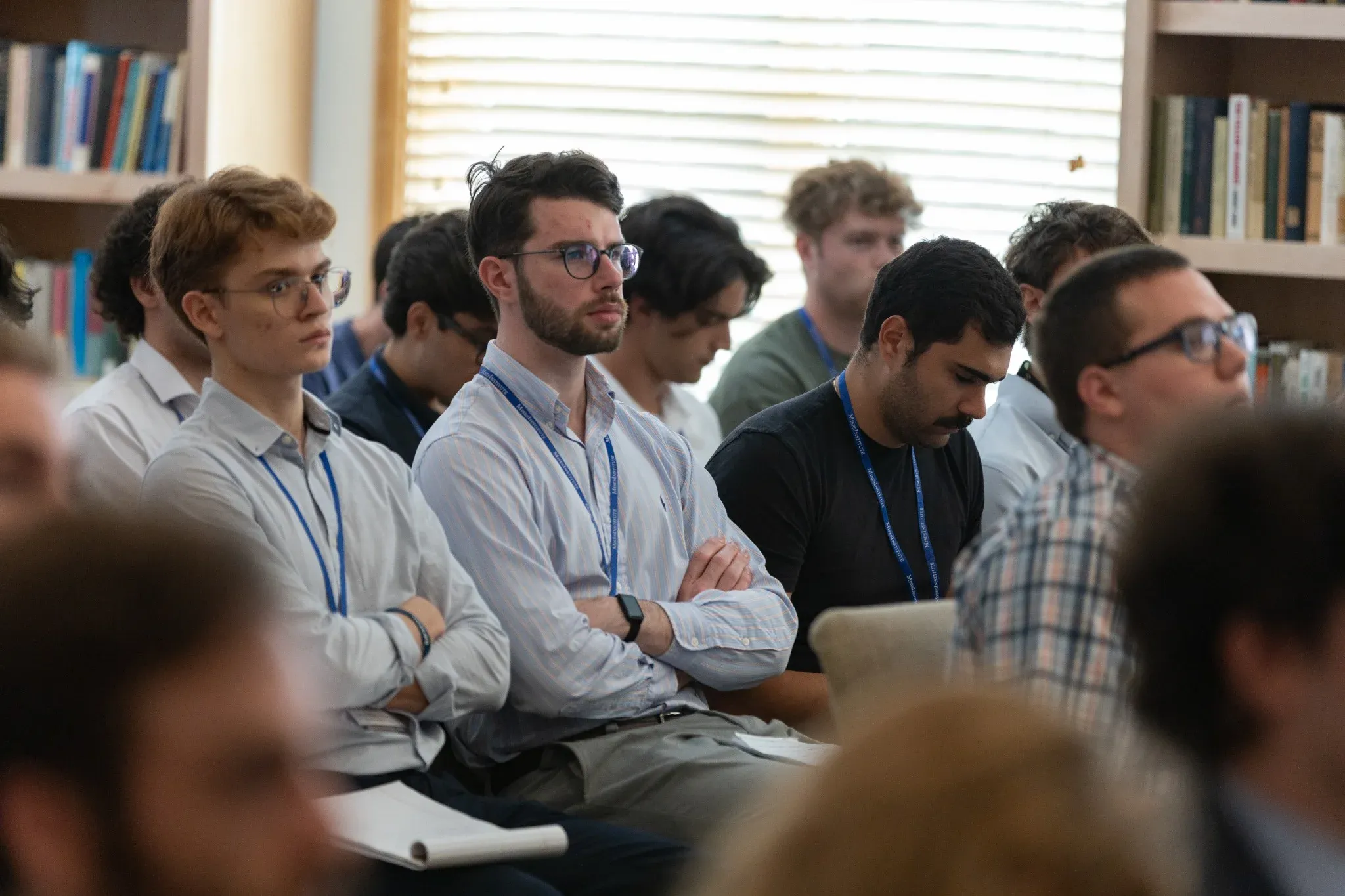 Students listening to a lecture in the library